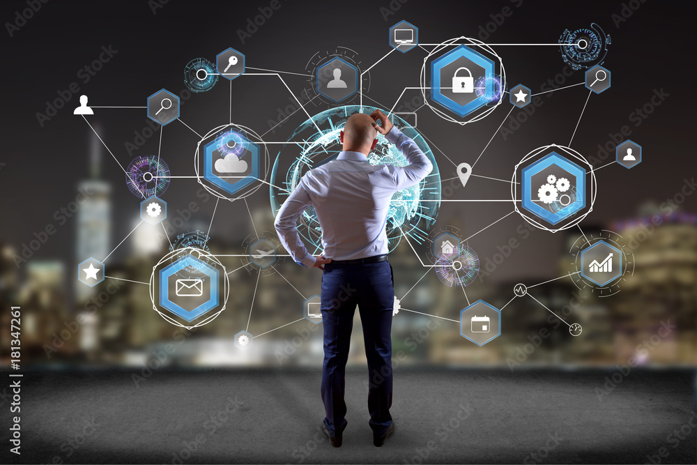 Poster businessman in front of a wall with an international business network connection displayed on a futu