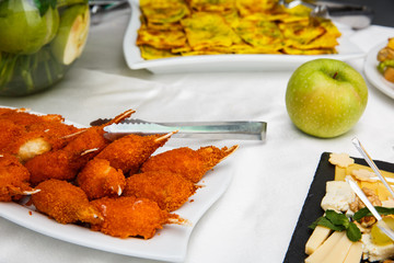 Hot and Spicy Buffalo Chicken Wings. Hot Meat Dishes - Fried Chicken Wings in a white plate