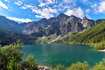 Obraz na płótnie Canvas Green water of Morskie Oko lake in summer, Tatra Mountains, Poland