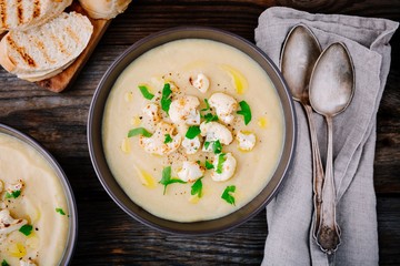 cauliflower cream soup with fried cauliflower and toasts