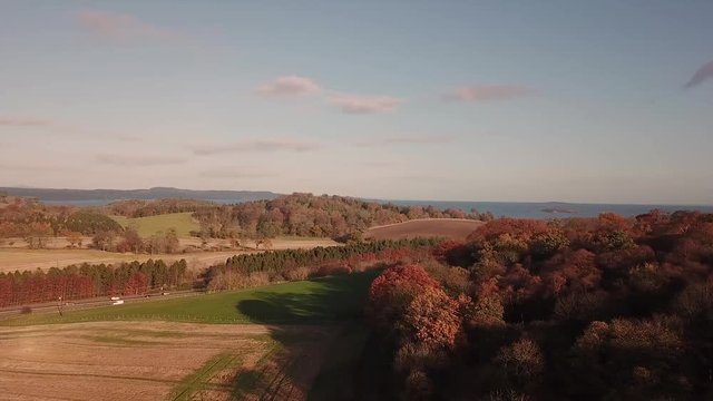Aerial panning shot from Cramond Island to the Forth Bridges, Scotland