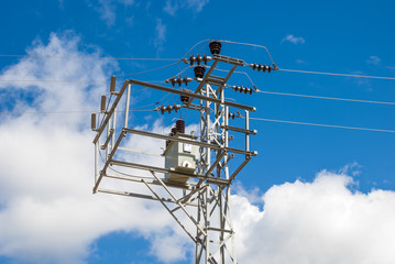 Rural  electrical transformer station on a metal column