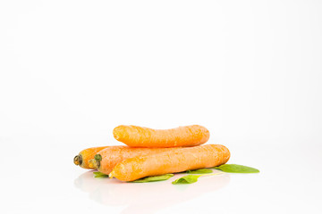 Fresh Carrots On White Background With Reflection