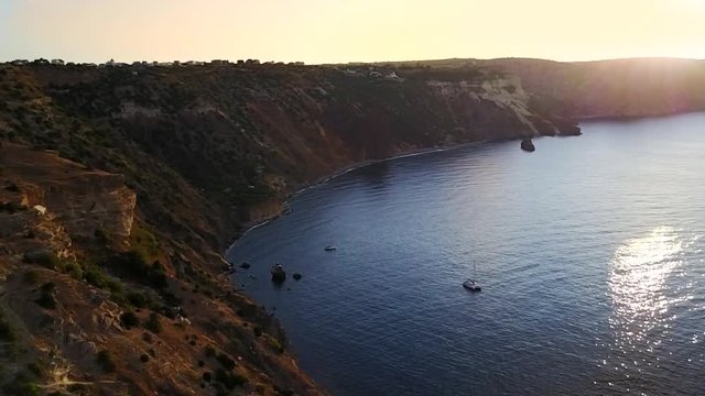 seascape. camera flies over the sea and rocks , video from the drone, flight over the sea