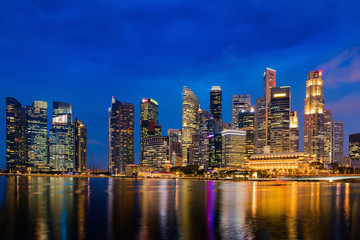 Fototapeta na wymiar Singapore downtown and illuminated of lights, Cityscape