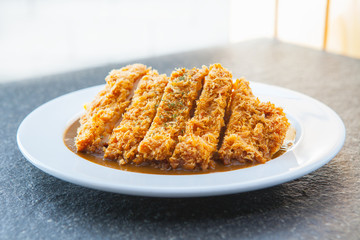 japanese curry with fried pork cutlet tonkatsu
