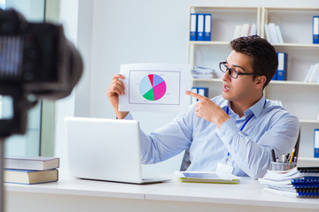 Business blogger doing webcast for his subscribers