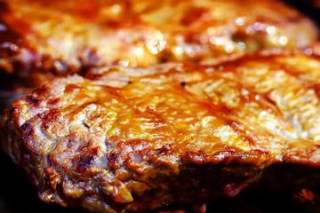 Juicy steaks close up image. Focus on foreground.