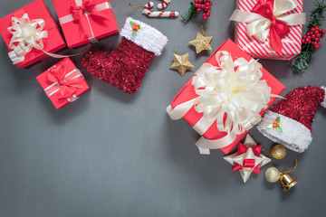 Above view aerial image of Happy new year & Merry Christmas background concept.All essential accessories on modern rustic black table at home office desk studio.Many object for winter festive.