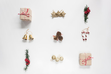 Flat lay aerial image of decoration & ornament Merry Christmas and Happy new year concept.Beautiful essential accessories on modern rustic white background at home office desk studio.Object for winter