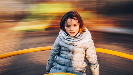 baby on carousel, dziecko na karuzeli © Marcin