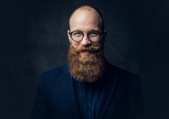 Fototapeta premium Redhead bearded male in a suit.