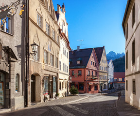 Old street in the historic center on a sunny  morning, Fussen, Bavaria, Germany