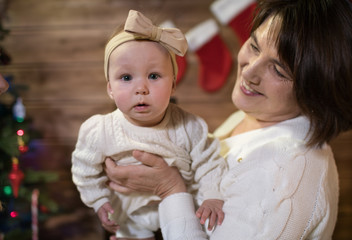 grandmother and granddaughter in christmas