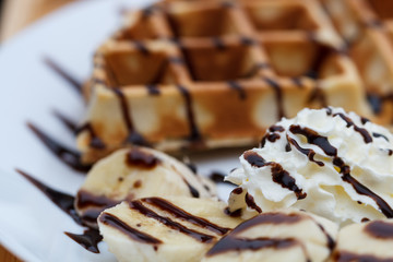 Close-up of delicious waffles and banana