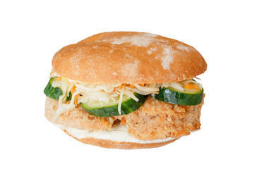 burger with chicken cabbage, cucumber and sauce isolated on white background
