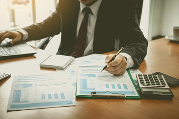 Businessman at working with financial reports