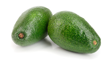 whole avocado isolated on white background close-up