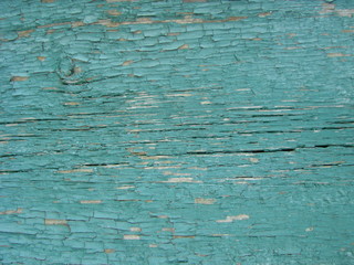 Vintage wood background with peeling paint.