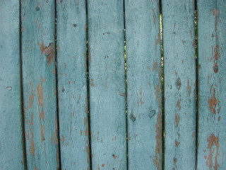 Vintage wood background with peeling paint.