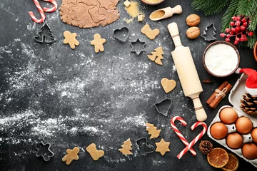 Deurstickers Baking christmas cookies on grey wooden table © 5second