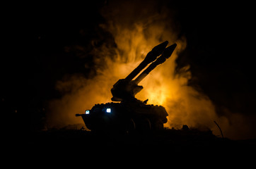 Rocket launch with fire clouds. Battle scene with rocket Missiles with Warhead Aimed at Gloomy Sky...