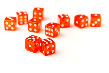red dice cubes on white background showing roll of eleven