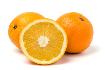 Ripe oranges on white, isolated.