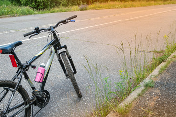 Fototapeta na wymiar the bicycle stands on the bike path 