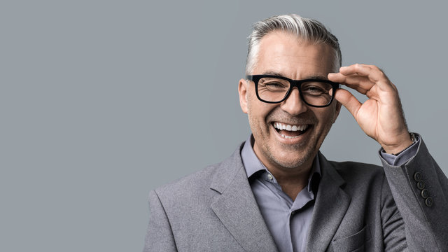 Smart Businessman With Glasses Posing