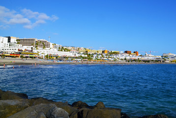 View on Torviscas beach in south Tenerife,Canary Islands,Spain.Travel or vacation concept.Selective focus.