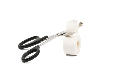 adhesive plaster with scissors isolated