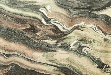 brown and green wave patterned marble