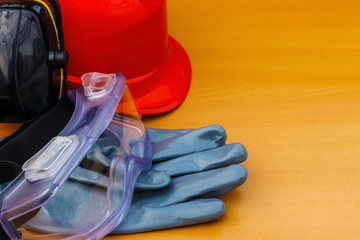Personal protective equipment: helmet, gloves, goggles.