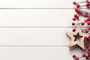 Christmas decor on the wooden white background.