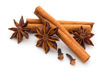 Cloves, anise and cinnamon isolated on white background.