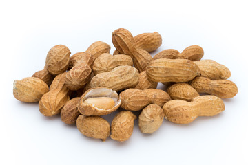 Dried peanuts on the white background.