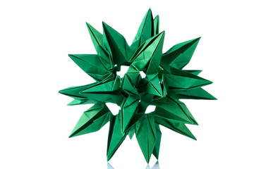 Abstract green cosmic body origami, isolated on white. Advanced level of craft project. Artwork, folding paper craft.