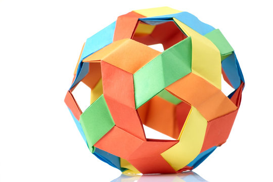 Multicolor sphericalal abstract origami decoration. Difficult level, skills and experience, art of folding paper.