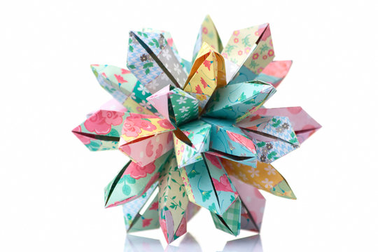 Amazing flower origami design. Made of colorful paper and assembled of many parts. Advanced level, art of folding.