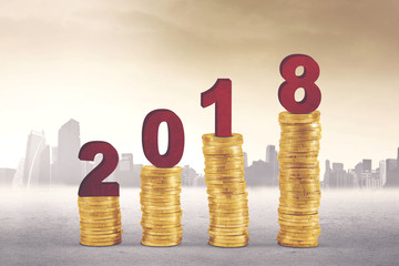 Gold coins with numbers 2018