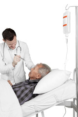 Obraz premium Doctor examining elderly patient eyes
