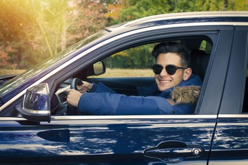 driver smiling inside the car