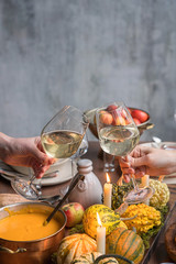 Autumn table setting with pumpkins. Thanksgiving dinner and fall decoration.