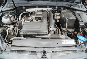 Car engine under the hood.
