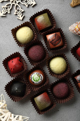 Holiday chocolate on gray christmas background