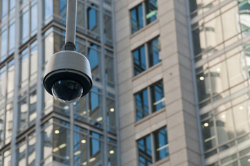 CCTV surveillance security dome camera in city center