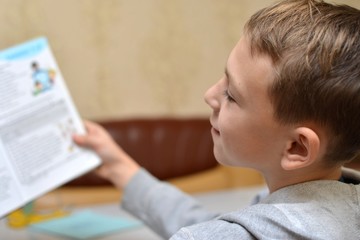 Selective focus of little boy learning how to write his name, Kid study at home, Children do homework at home, Concept for toddler learn about writing the letter or message