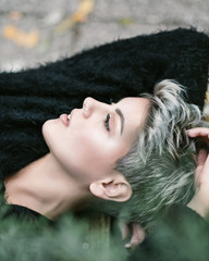 close up of young pretty woman with grey hair