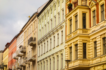 Fototapeta na wymiar yellow facaded residential houses in berlin